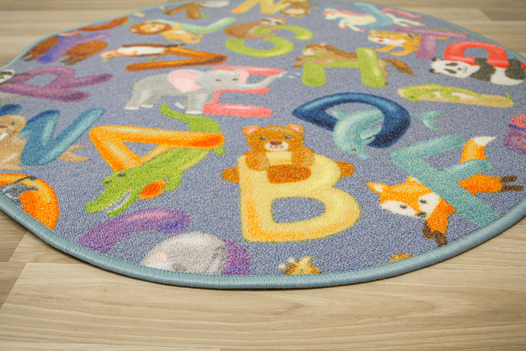 Detský koberec Alfabet 19 sivý kruh